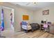 room with laminate flooring, closet, and playful decor at 171 Ponderosa Drive, Fayetteville, GA 30214