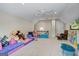 Play room featuring carpeted floors, neutral paint, and lots of toys at 171 Ponderosa Drive, Fayetteville, GA 30214
