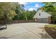 Long driveway with basketball hoop and multi-car garage at 171 Ponderosa Drive, Fayetteville, GA 30214