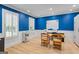 Bright office space with shuttered windows, built-in storage, and light wood floors at 171 Ponderosa Drive, Fayetteville, GA 30214