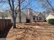 Backyard featuring outdoor furniture, lawn, and surrounding fence at 486 Village Cir, Stockbridge, GA 30281