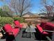 Outdoor space featuring patio seating and a tranquil setting surrounded by greenery at 486 Village Cir, Stockbridge, GA 30281