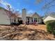 Backyard featuring outdoor furniture and plenty of room at 486 Village Cir, Stockbridge, GA 30281