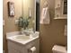 Bathroom featuring bright natural light, standard fixtures, and ample counter space at 486 Village Cir, Stockbridge, GA 30281