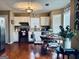 Bright kitchen with hardwood floors, stainless steel appliances, and a charming breakfast nook at 486 Village Cir, Stockbridge, GA 30281