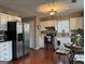Kitchen with stainless steel refrigerator and white cabinets at 486 Village Cir, Stockbridge, GA 30281