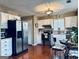 Functional kitchen with modern appliances, hardwood floors, and ample cabinet space at 486 Village Cir, Stockbridge, GA 30281