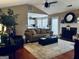 Spacious living room with hardwood floors, fireplace, and open layout at 486 Village Cir, Stockbridge, GA 30281
