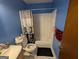 Cozy full bathroom featuring a shower-tub combination, toilet, and single sink vanity at 1071 Ponderosa Park Dr, Forest Park, GA 30297