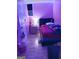 Bedroom with hardwood flooring, nightstand, and black headboard at 1071 Ponderosa Park Dr, Forest Park, GA 30297