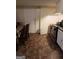 Cozy kitchen with tiled floors, white appliances, and dining area at 1071 Ponderosa Park Dr, Forest Park, GA 30297