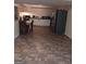 Basement kitchen with tile flooring and matching black appliances at 1071 Ponderosa Park Dr, Forest Park, GA 30297