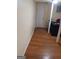 Hallway with hardwood floors and white trim at 1071 Ponderosa Park Dr, Forest Park, GA 30297