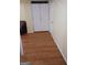 Hallway with hardwood floors and white trim at 1071 Ponderosa Park Dr, Forest Park, GA 30297
