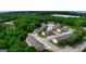Aerial view of neighborhood with tree lined streets and manicured lawns at 6120 Ripple Way # 46, South Fulton, GA 30349