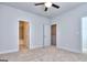 Neutral carpet bedroom with bathroom and closet, creating a serene and functional living space at 6120 Ripple Way # 46, South Fulton, GA 30349