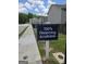Street view showing signage promoting 100% financing at Morning Creek Forest community at 6120 Ripple Way # 46, South Fulton, GA 30349