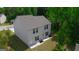 Aerial view of back of house with fenced-in yard and deck at 6120 Ripple Way # 46, South Fulton, GA 30349
