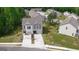 Exterior shot of well-maintained two-story home with individual driveways at 6120 Ripple Way # 46, South Fulton, GA 30349