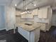 Kitchen featuring island, white cabinets, granite countertops, stainless steel appliances, and recessed lighting at 6120 Ripple Way # 46, South Fulton, GA 30349