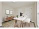 Bright home office with modern desk, neutral walls, and ample natural light at 122 Claxton Ct, Jonesboro, GA 30238