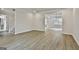 Bright living room featuring wood-style floors and open floor plan, freshly painted at 122 Claxton Ct, Jonesboro, GA 30238