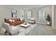 Stylishly decorated living room with modern furniture and neutral decor at 122 Claxton Ct, Jonesboro, GA 30238