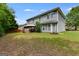 A spacious backyard with a lush lawn and a gazebo for outdoor enjoyment at 7115 Secret Rose, Douglasville, GA 30134