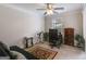Bedroom with desk, office chair, and a telescope at 7115 Secret Rose, Douglasville, GA 30134