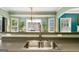 Kitchen sink in a well-lit room, with a view of a window with white blinds and plants at 7115 Secret Rose, Douglasville, GA 30134
