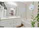 Bright bathroom features double vanity, soaking tub, and decorative plants for a spa-like feel at 5284 Benjamin Trl, Ellenwood, GA 30294