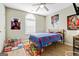 A bedroom features a playful theme, comfortable bed, and bright decor at 5284 Benjamin Trl, Ellenwood, GA 30294
