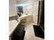 Bathroom featuring soaking tub, and vanity at 232 Spalding Gates Drive, Atlanta, GA 30328
