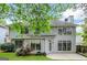 Two-story home featuring a well-manicured backyard at 232 Spalding Gates Drive, Atlanta, GA 30328