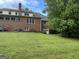 Large brick house with large lawn, deck, and garage, great for outdoor activities at 2451 Old Salem Se Cir, Conyers, GA 30013