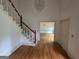 Spacious foyer with staircase, hardwood floors and open to other rooms at 2451 Old Salem Se Cir, Conyers, GA 30013