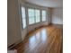 Bright living room with hardwood floors and large windows at 2451 Old Salem Se Cir, Conyers, GA 30013