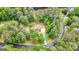 Aerial view showcasing property and wooded surroundings at 200 Whitney Way, Fayetteville, GA 30214