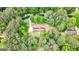Aerial view showcasing home surrounded by lush greenery at 200 Whitney Way, Fayetteville, GA 30214