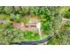 Aerial view showcasing the backyard and wooded lot at 200 Whitney Way, Fayetteville, GA 30214