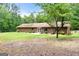 Backyard and exterior showing back of house at 200 Whitney Way, Fayetteville, GA 30214