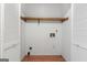 Spacious walk-in closet featuring a wooden shelf and white paneled doors, providing ample storage at 200 Whitney Way, Fayetteville, GA 30214