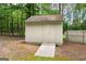 An outbuilding is on the property at 200 Whitney Way, Fayetteville, GA 30214