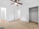 Spacious bedroom featuring neutral carpeting and an ensuite bathroom at 2609 Lake Harbin Rd, Morrow, GA 30260