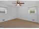 Cozy bedroom with neutral carpeting and bright natural light from two windows at 2609 Lake Harbin Rd, Morrow, GA 30260