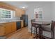 Eat-in kitchen features matching appliances and laminate flooring at 2609 Lake Harbin Rd, Morrow, GA 30260