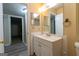 Bathroom with single sink vanity and large mirror at 2986 Parc Lorraine, Lithonia, GA 30038