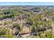 Aerial view of a home with a large lot outlined by a property line for real estate purposes at 3133 Callie Still Rd., Lawrenceville, GA 30045