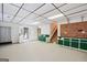 Spacious basement with storage cabinets, workbench, and convenient walkout access to the exterior at 3133 Callie Still Rd., Lawrenceville, GA 30045