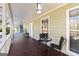 Cozy outdoor seating area on the porch, perfect for relaxation and enjoying the view at 3133 Callie Still Rd., Lawrenceville, GA 30045